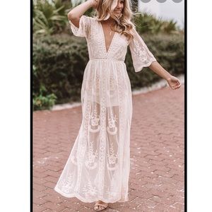 Cream colored maxi lace romper.